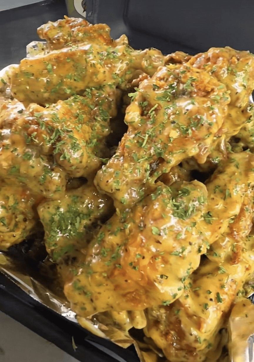 Lemon pepper chicken wings — $1 Wing Wednesday at Lil Moe's Potato Trap Houston food truck